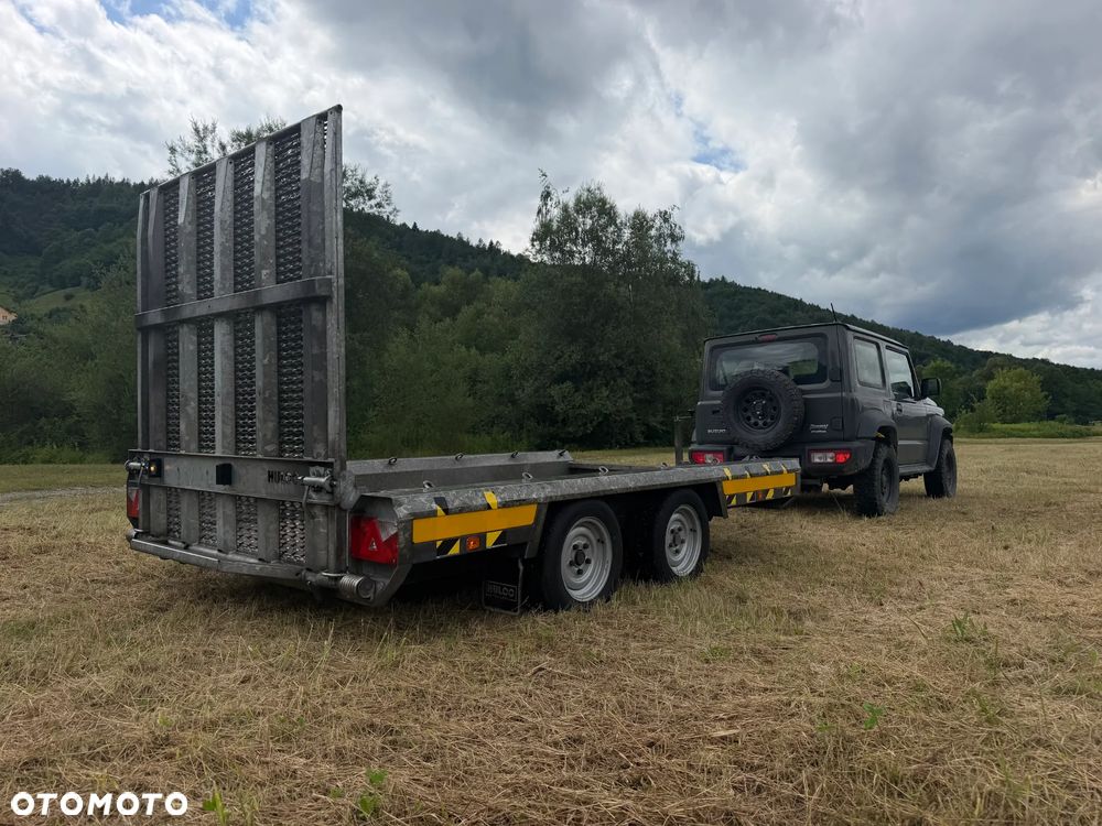 Inny Przyczepa Dwuosiowa Ciężarowa-LAWETA Do Koparek Maszyn Budowlanych. HULCO TERRAX-2 3001-LK.  NAJAZD Pełny Klapa z Bardzo mocnej konstrukcji. Lekki system otwierania najazdu jedną ręką! DMC 3000Kg! Jest To Laweta marki PREMIUM. Dwie ośie hamujące! Pełny ocynk. HULCO to Francuski Producent największy w Europie! Potężna jakość wykonania! Okazja Tanio. Laweta sprowadzona z Norwegii. Zero zużycia jak nówka sztuka! OKAZJA - 1
