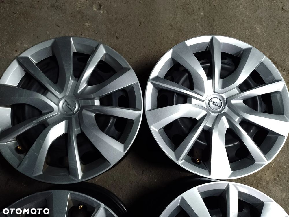 Felgi OPEL 4x108,15- ET20,kołpaki - 3