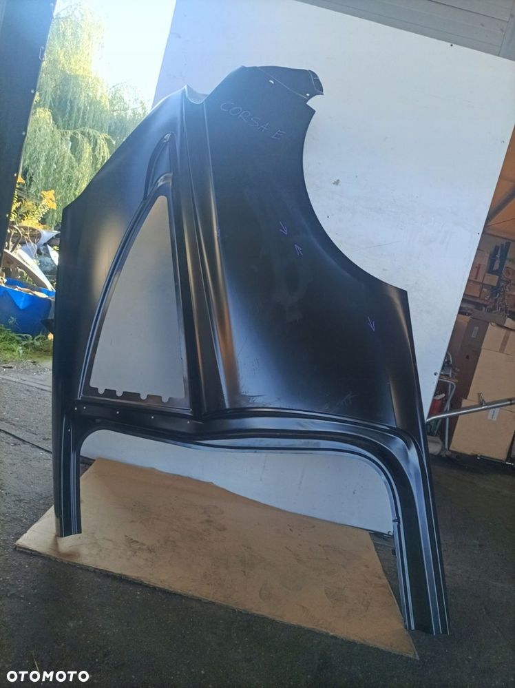 OPEL CORSA E 3D BŁOTNIK TYŁ TYLNY LEWY NOWY ORYG 39098989