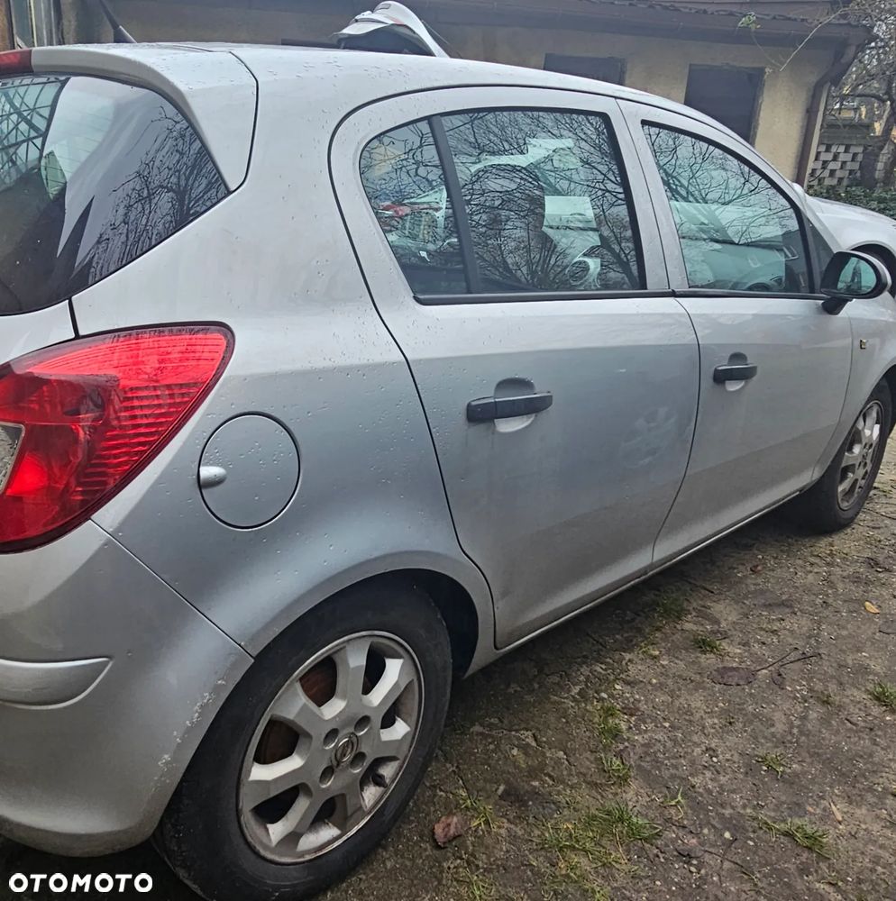 Opel Corsa 1.2 16V Enjoy - 11