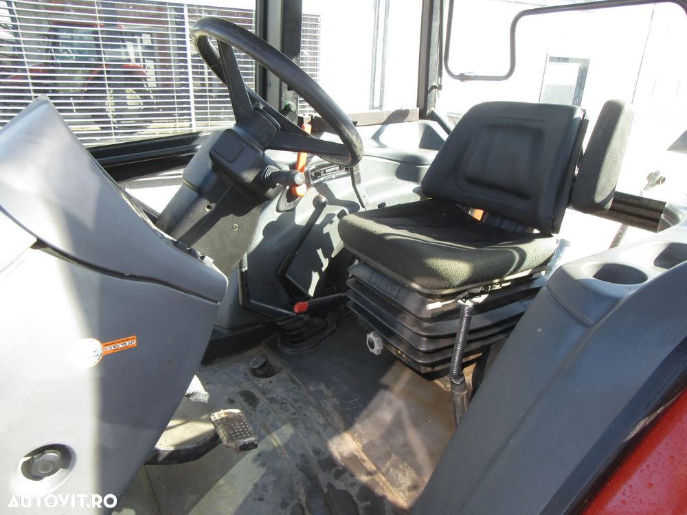 New Holland L65 - 11