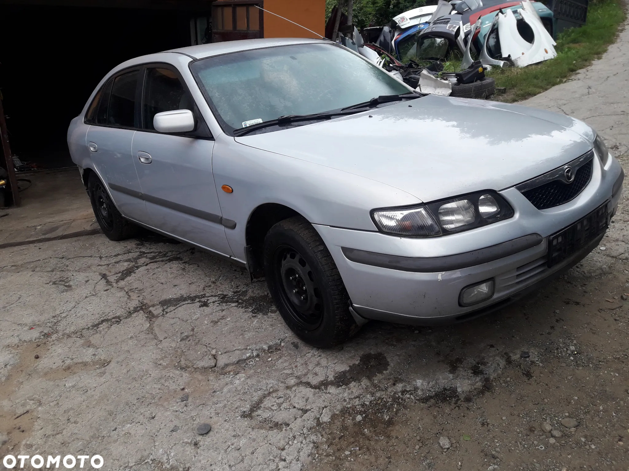 Mazda 626 GF GW 97-02   Maska lampa zderzak pas atrapa 18G 22V - 4