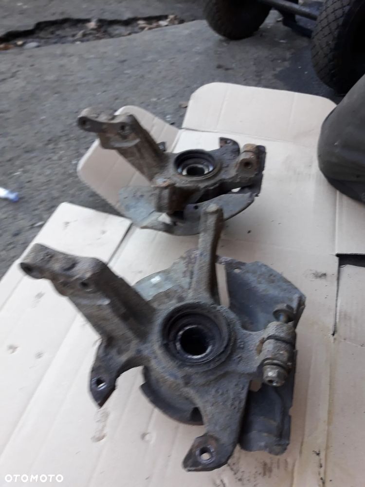 Mazda 323f 323 323p BA 94-98  Zwrotnica piasta Prawa lewa przednia prz - 3