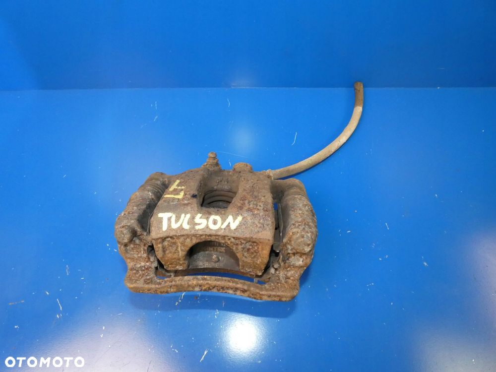 HYUNDAI TUCSON III ZACISK HAMULCOWY LEWY TYŁ - 1