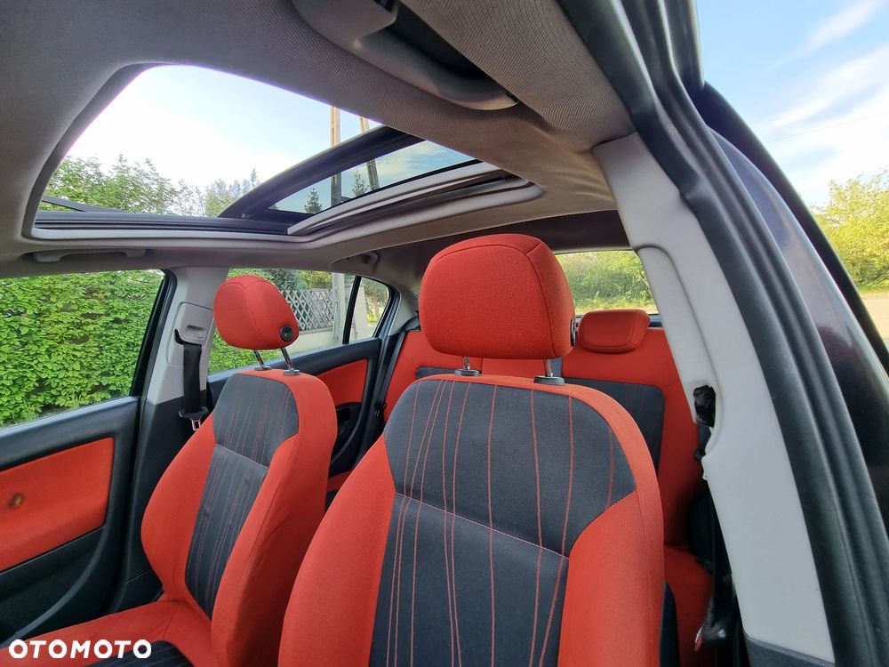 Opel Corsa 1.4 16V Cosmo - 13