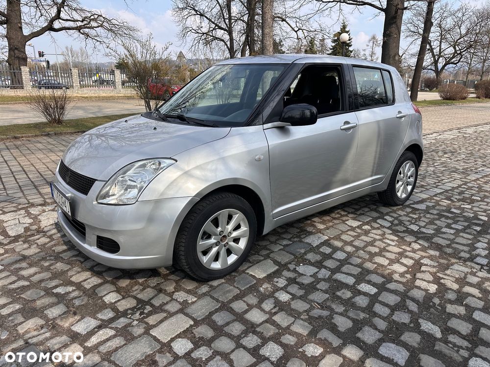 Suzuki Swift 1.2 4x4 Club - 1