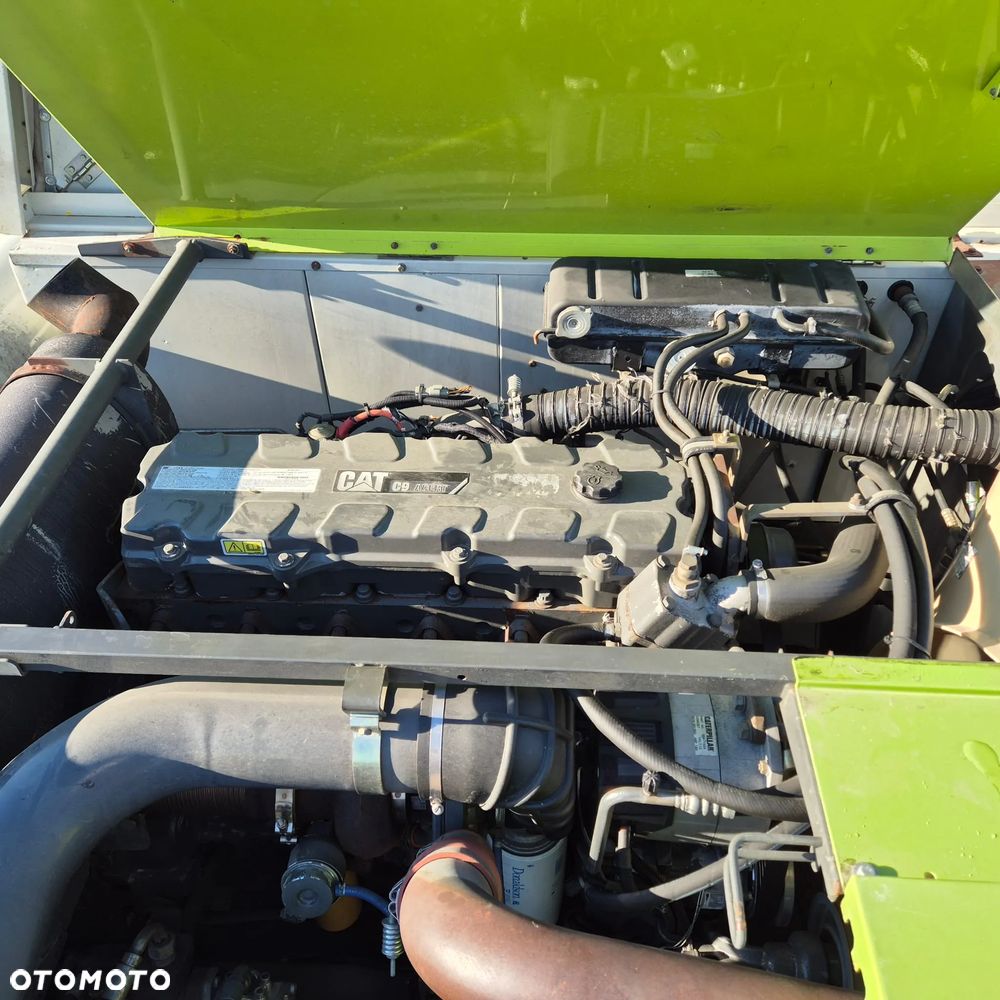 Claas Lexion 650 z hederem - 10