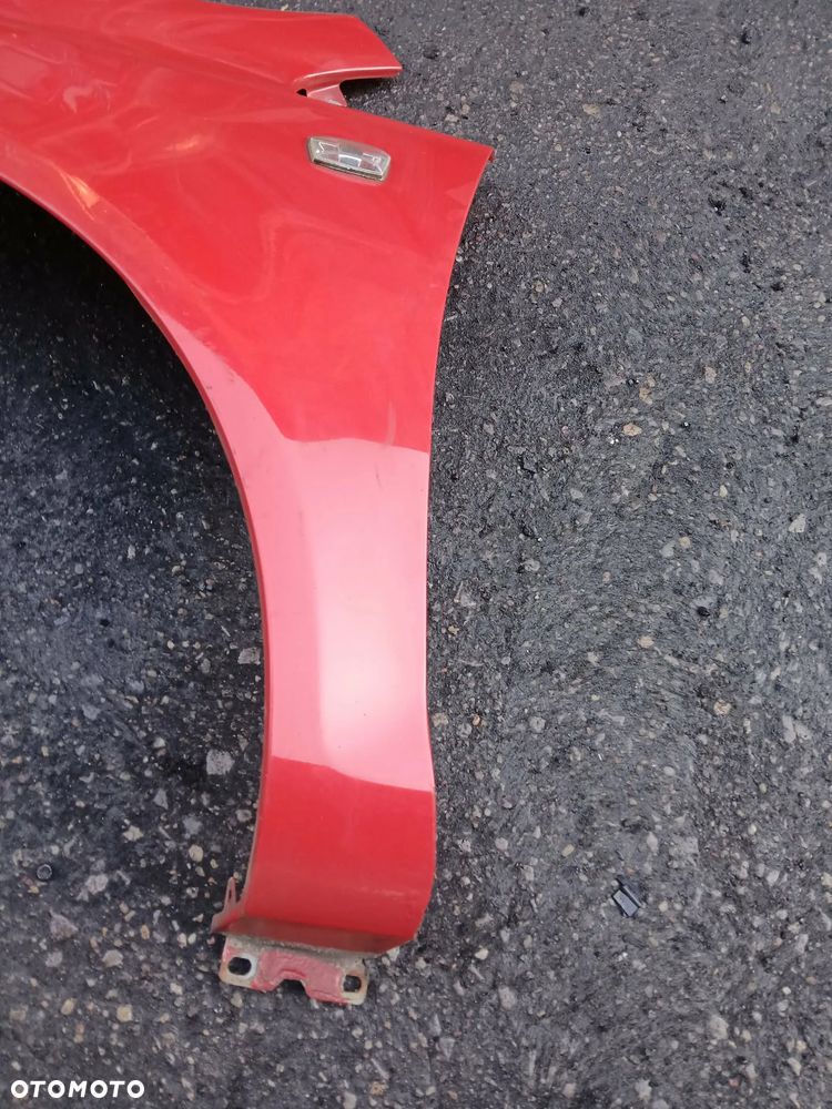 Opel Corsa D Błotnik lewy - 3