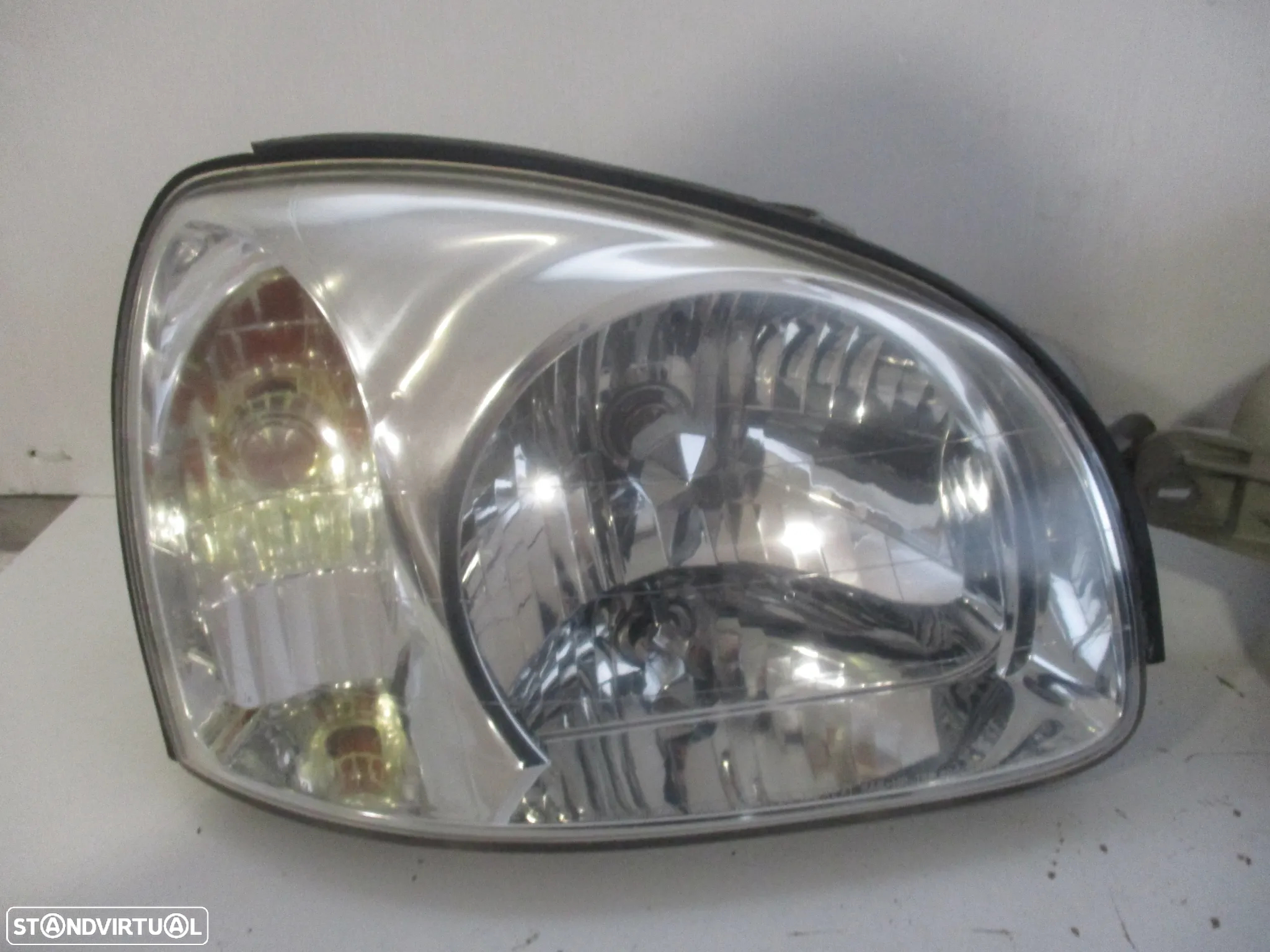 farol optica hyundai Santa Fé 2003 - 3