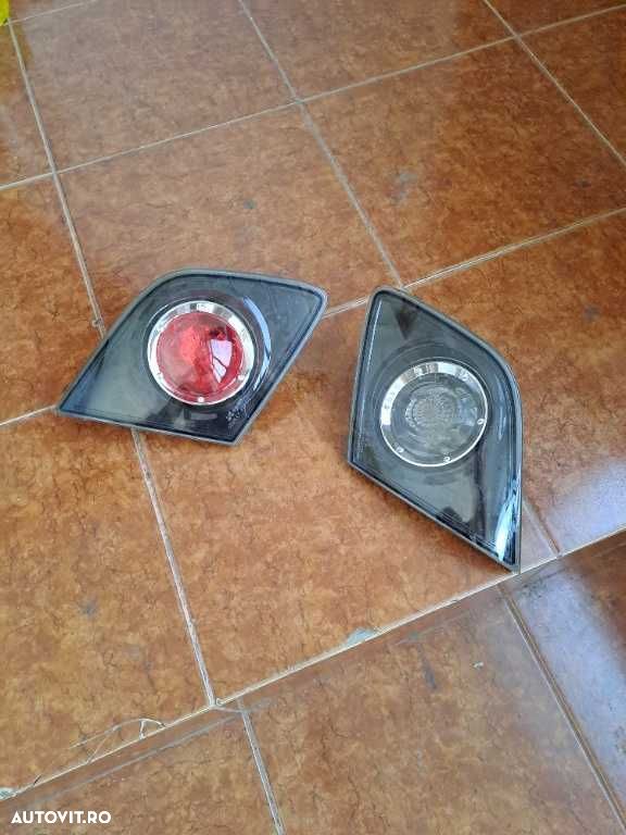 Stop stanga dreapta pe portbagaj Mazda 3 an 2004-2006 original