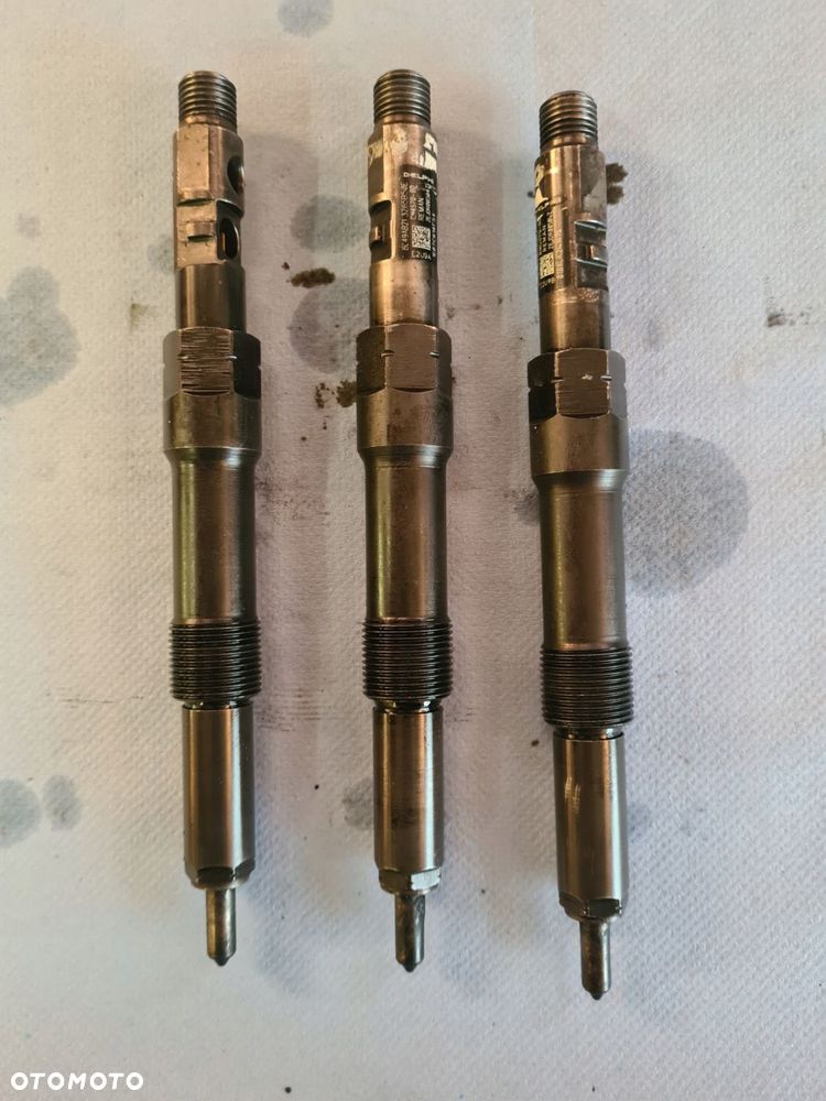 wtryskiwacz rm4s7q-bd ford mondeo mk3 2.0 tdci - 1