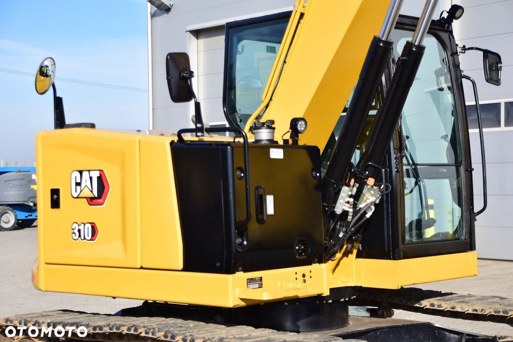 Caterpillar 310 - 16