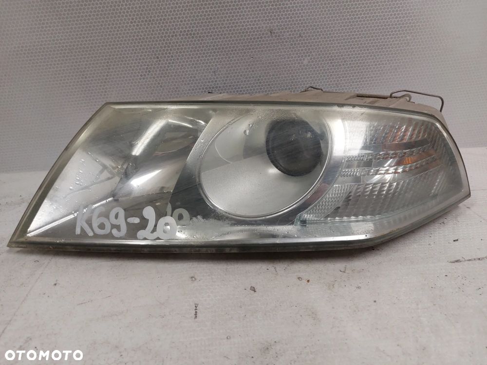 .  LAMPA PRZOD PRZEDNIA LEWA SKODA OCTAVIA 2 - 1