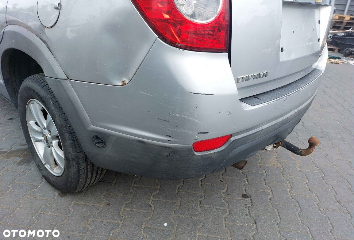 ZDERZAK TYŁ + ODBLASKI CHEVROLET CAPTIVA I 98U 06-10r - 3
