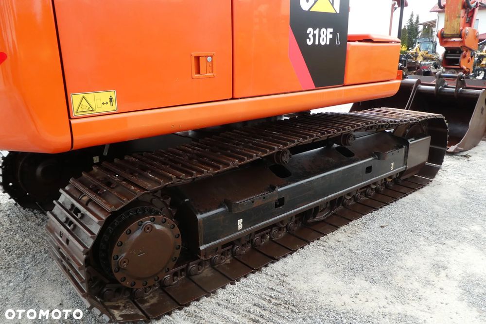 Caterpillar M 318F Z NIEMIEC TRZY ŁYŻKI - 16