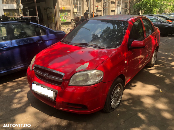 Dezmembrez Chevrolet Aveo rosu 1,4 benzina 2007