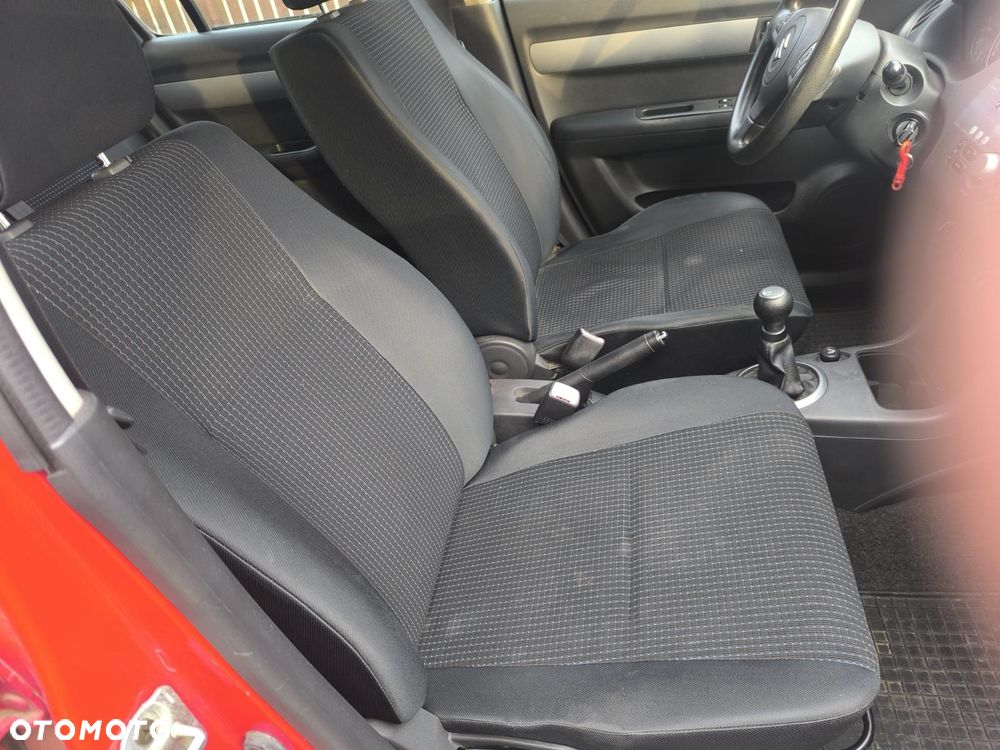 Suzuki Swift 1.3 Club - 8