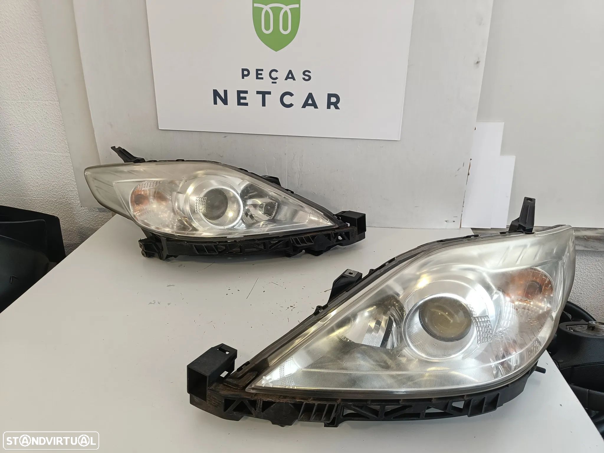 Farol óptica esquerdo Mazda 5 2009 - 1