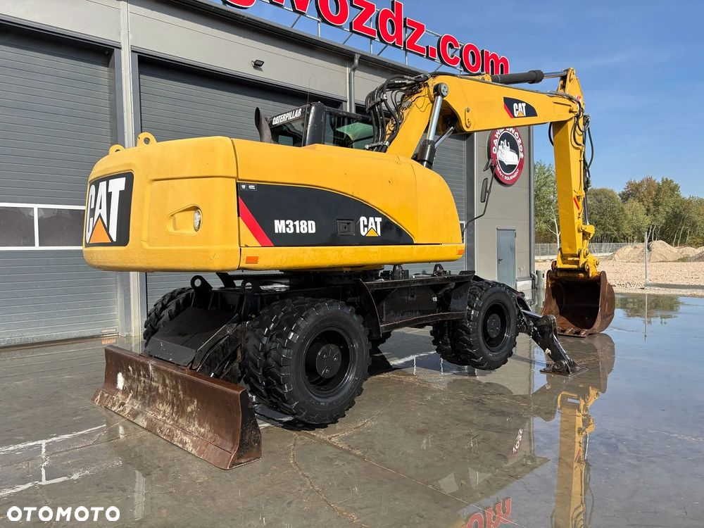 Caterpillar M318D - 4