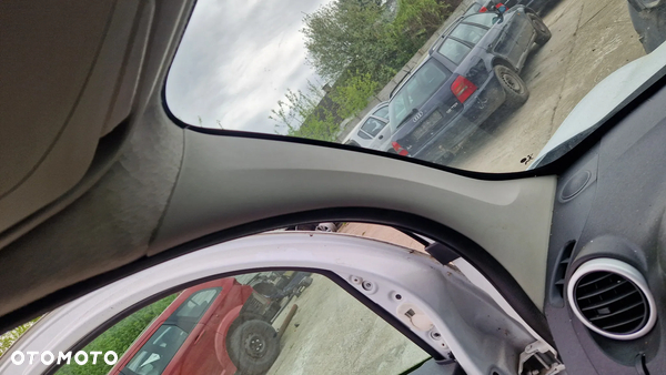 RENAULT KANGOO II 2012r OSŁONA SŁUPKA LEWY PRZÓD