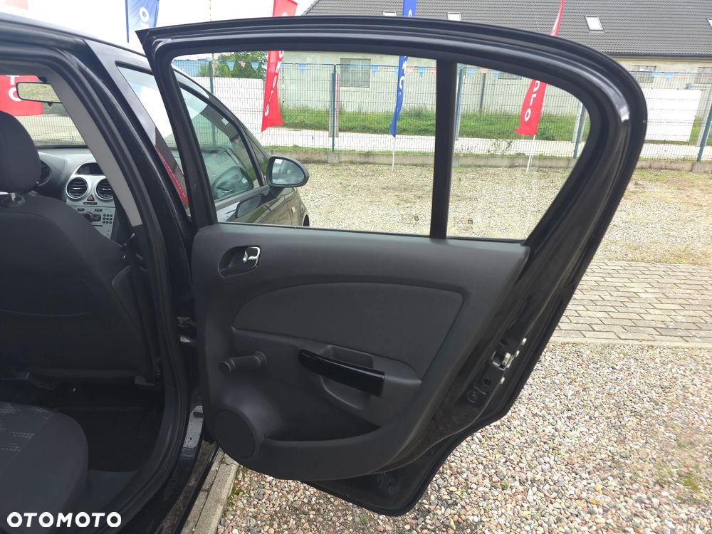 Opel Corsa 1.2 16V Enjoy - 11