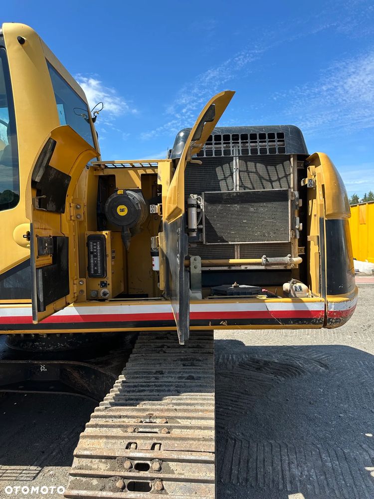 Caterpillar Używana koparka gąsienicowa CAT 318C - 9