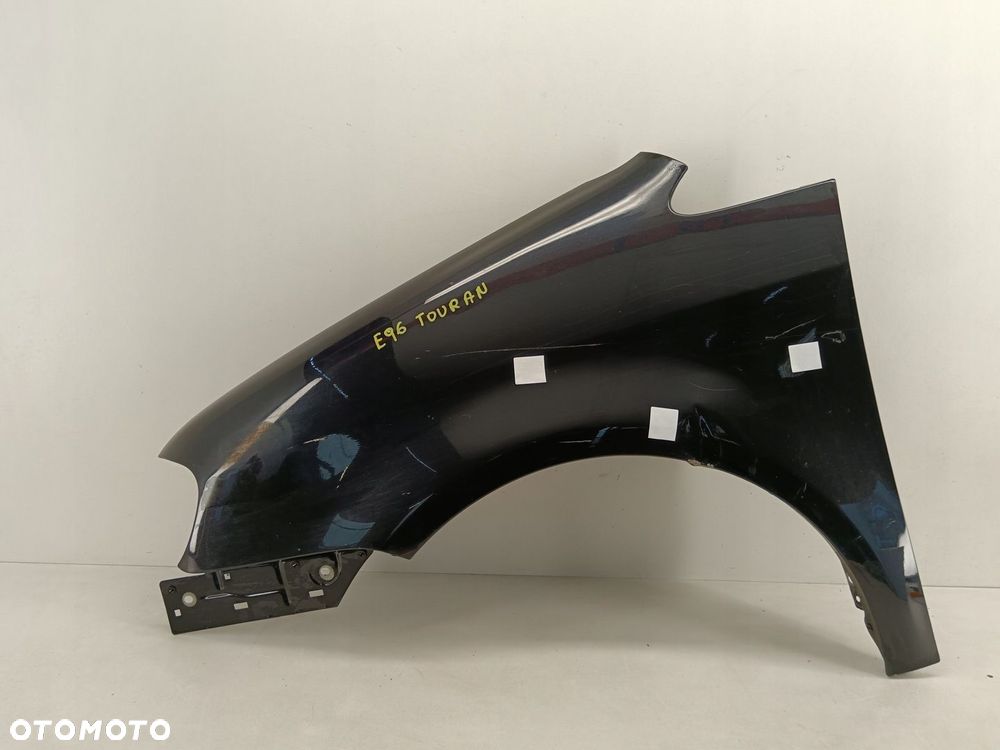 BŁOTNIK LEWY PRZEDNI VW TOURAN 1 LIFT 07-11 - 1