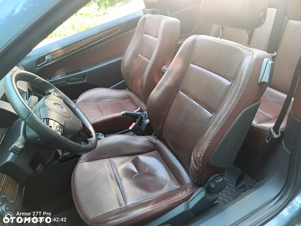 Opel Astra 1.8 Cosmo - 12