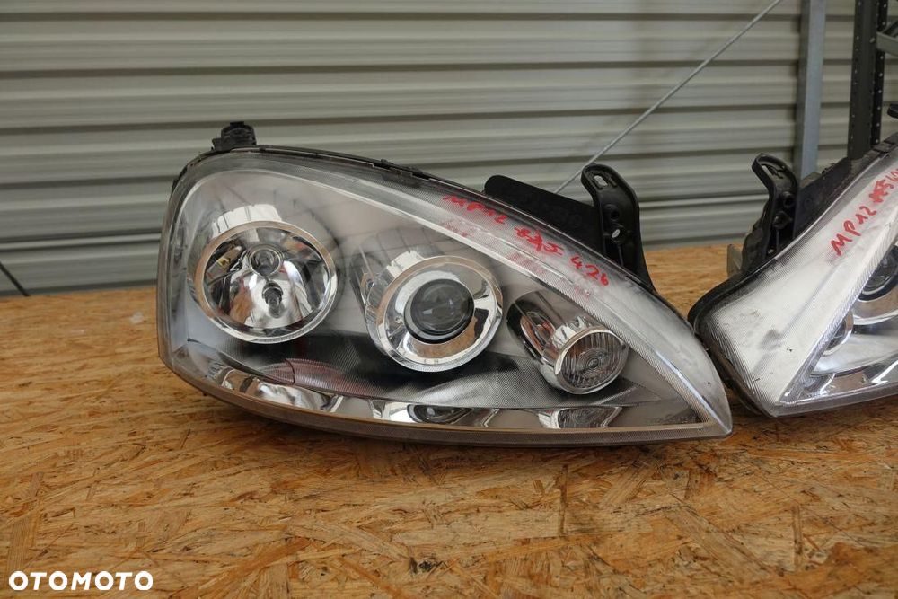 REFLEKTOR 2 LAMPY PRZÓD KPL EUROPA OPEL CORSA C LIFT 1321212 - 4