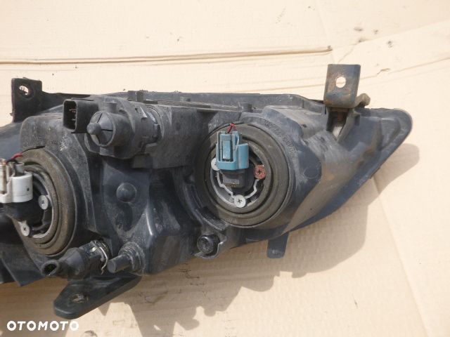 LAMPA PRAWY PRZÓD PRAWA PRZEDNIA HONDA CIVIC VII LIFT SEDAN 5D 04-06 - 12