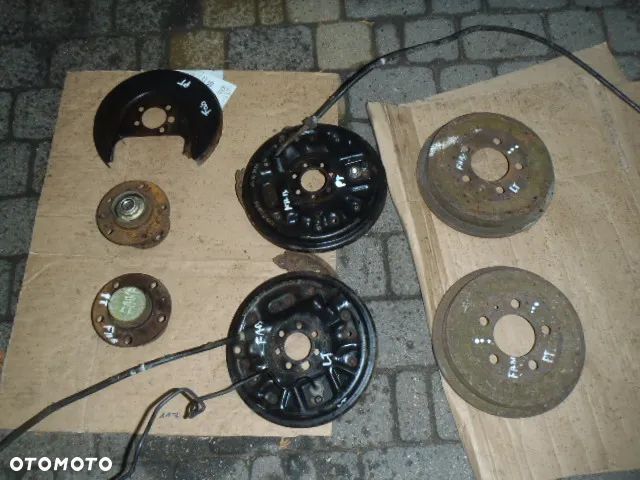 bęben bębny osłona tarcza kotwiczna cylinderek piasta łożysko czop tylne zawieszenie fabia polo ibiza passat b5 jak nowe oryginaał - 1