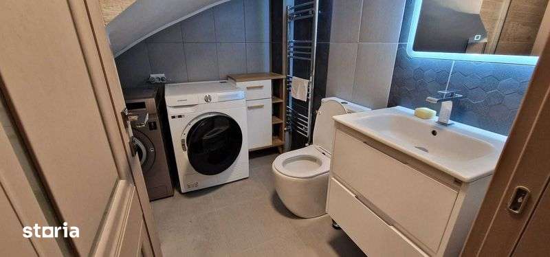 Un apartament inchiriere — fotografia 3