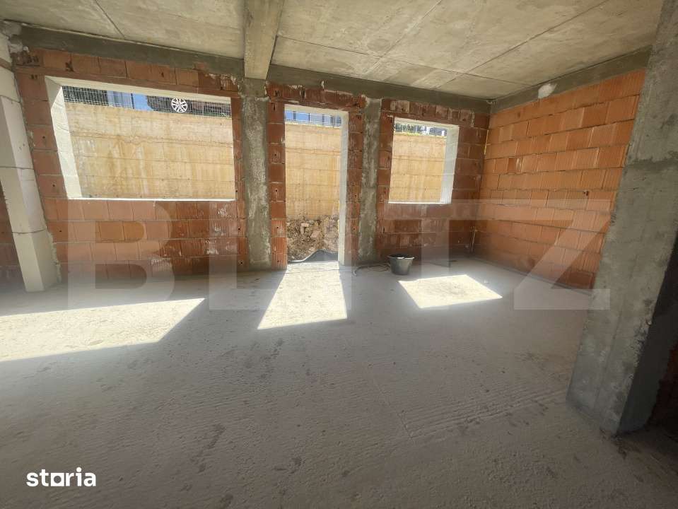 Apartament cu 3 camere, dispus pe doua niveluri, cu gradina — fotografia 1