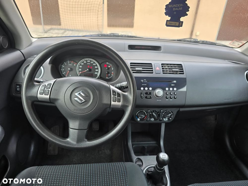 Suzuki Swift 1.3 Club - 9