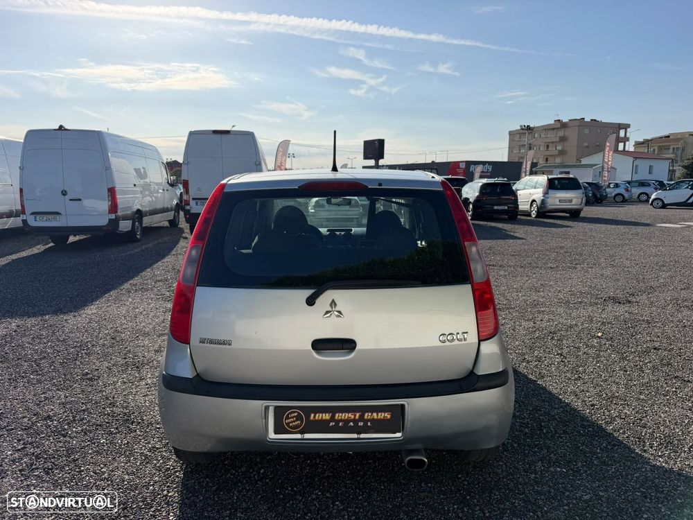 Mitsubishi Colt 1.1 Inform RCD/AC - 10