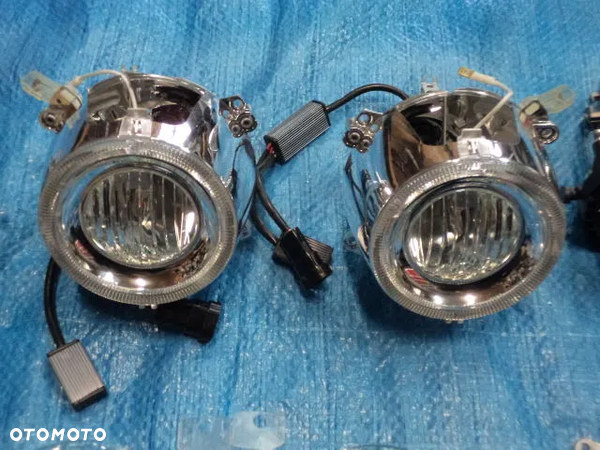 OPRAWKA RING LAMPY XENON LEWY PRAWY KOMPLET 1305300499 1305300500 BMW E92 E93