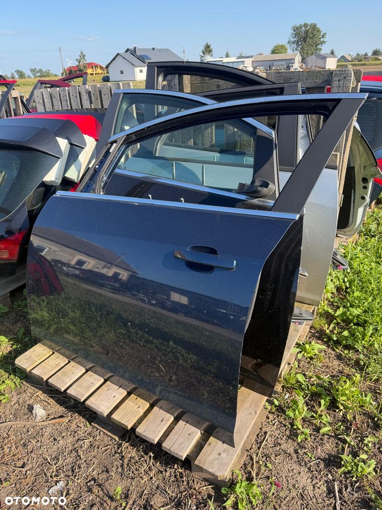 Drzwi lewe przednie lewy przód Opel Astra J IV Z22A oryginał - 2