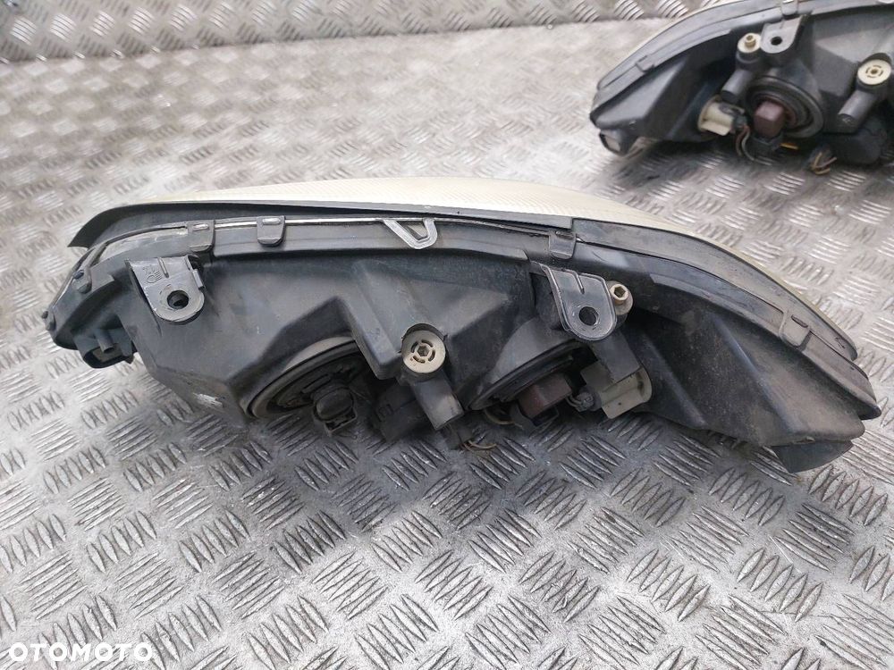 LAMPA LEWY PRZÓD + PRAWY PRZÓD OPEL ZAFIRA A LIFT 89100055 89100054 - 9