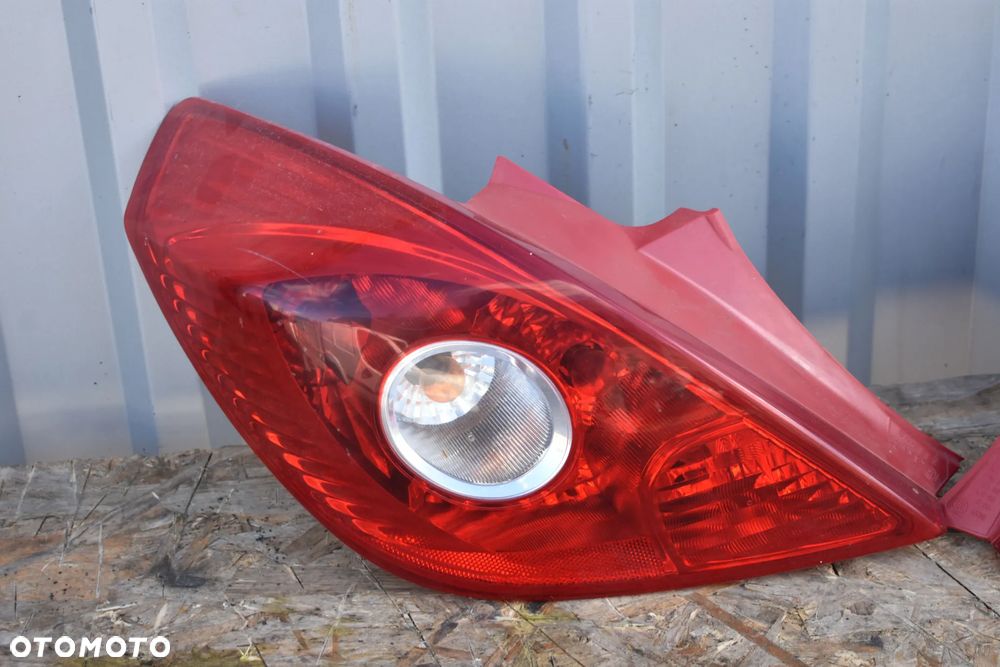 LAMPA LAMPY TYŁ OPEL CORSA D 3D 2007r. - 2