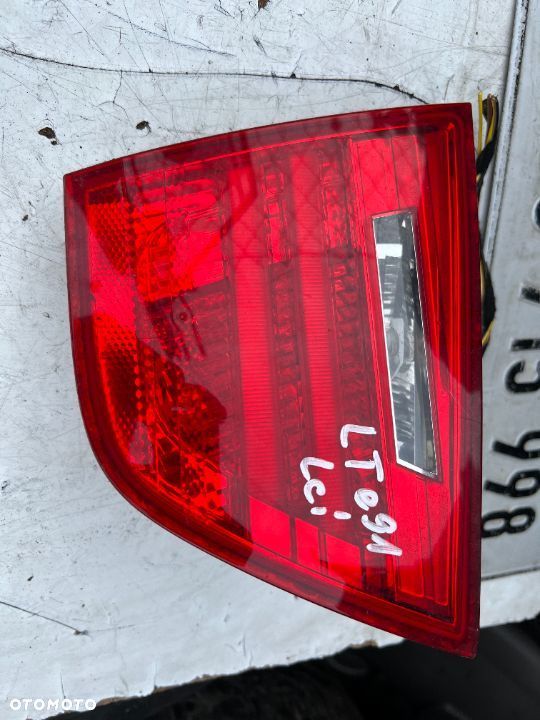 Lampa tylna lewa klapy bagażnika Bmw e91 lift lci - 2