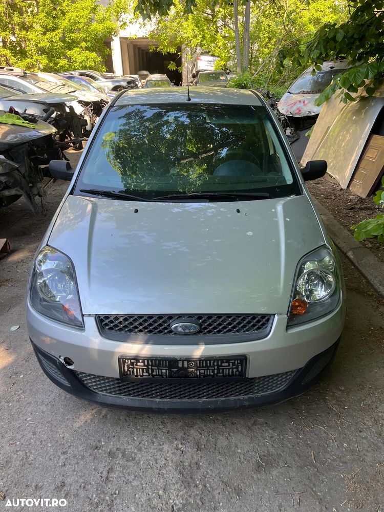 Dezmembrez Ford Fiesta MK5 facelift 2007 gri argintiu 1,4 TDCI 50KW cod culoare 62 - 11