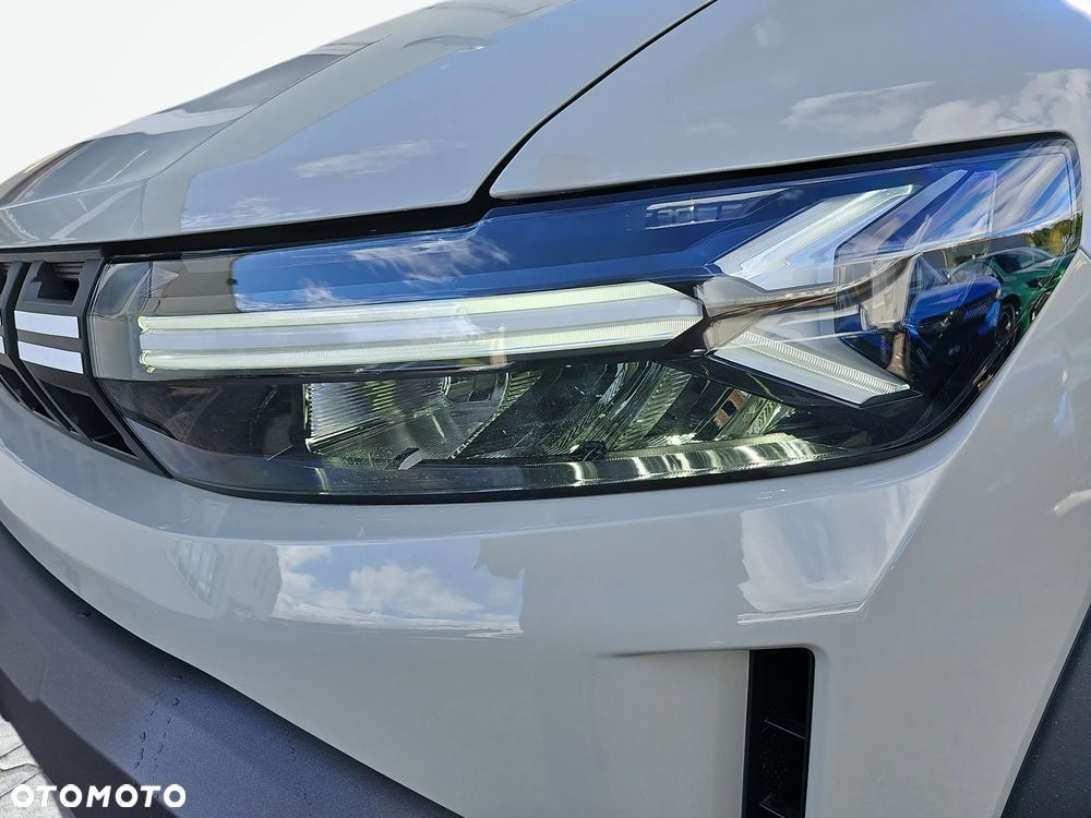 Dacia Duster 1.8 Hybrid 155 Journey MMT - 24