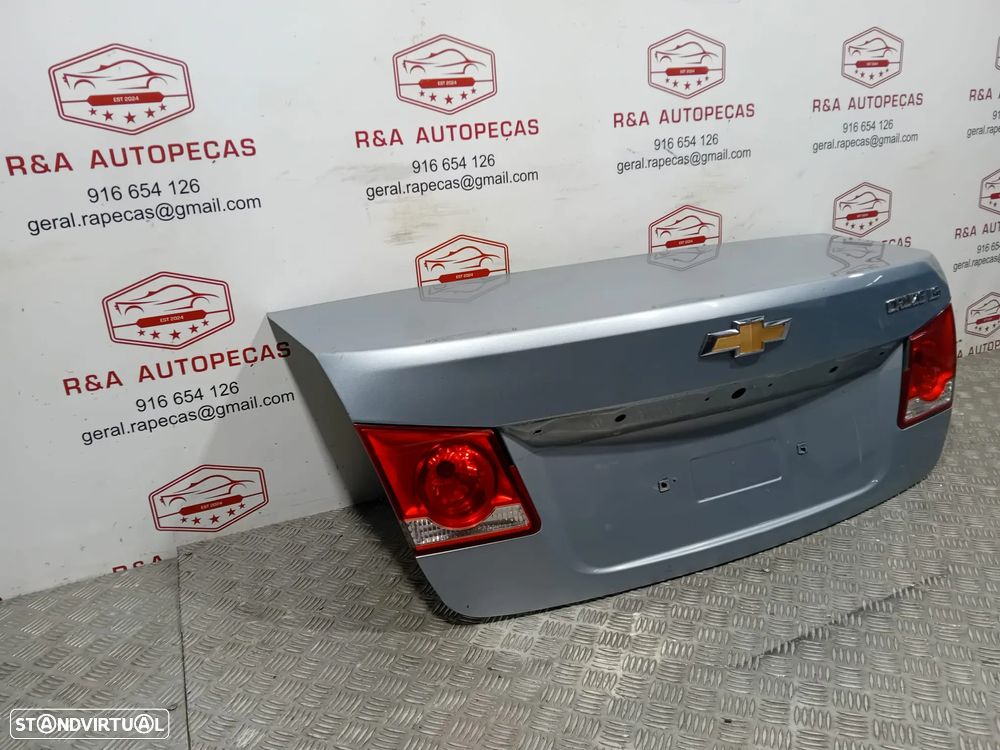 Tampa de Mala Chevrolet Cruze Original - 4