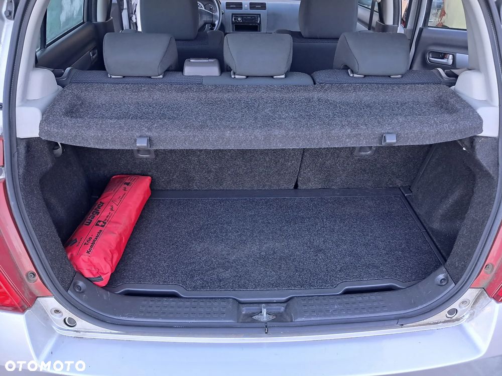 Suzuki Swift 1.3 Club - 8