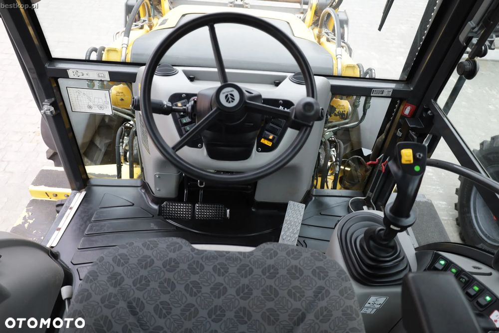 New Holland B100C - 26