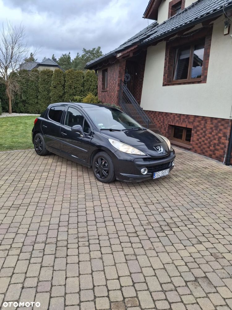 Peugeot 207 ver-1-6-16v-sporty - 1