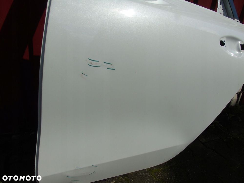 Kia Proceed drzwi tylne lewe 77003-J7700 - 2