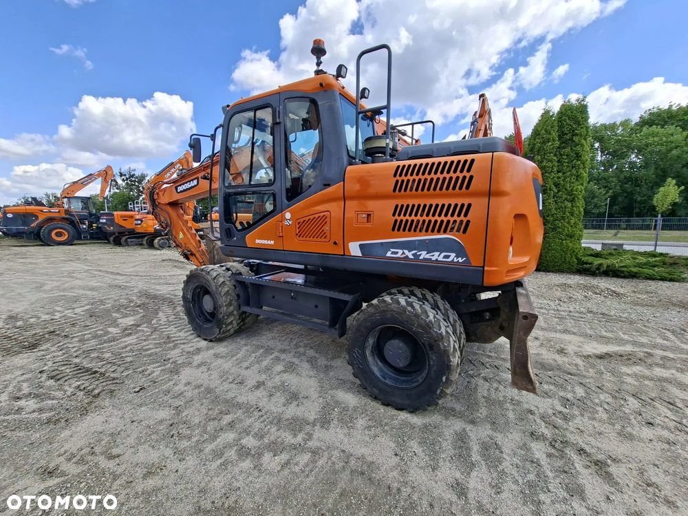 Doosan DX140W-5 - 12