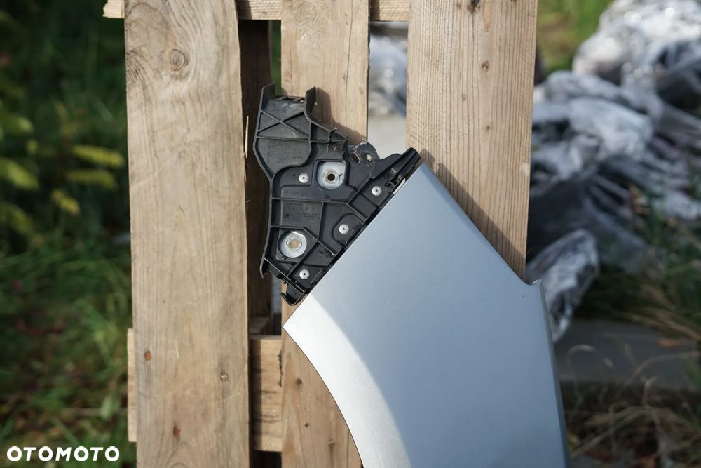 Błotnik przód przedni lewy Opel Astra IV J Z179 - 2