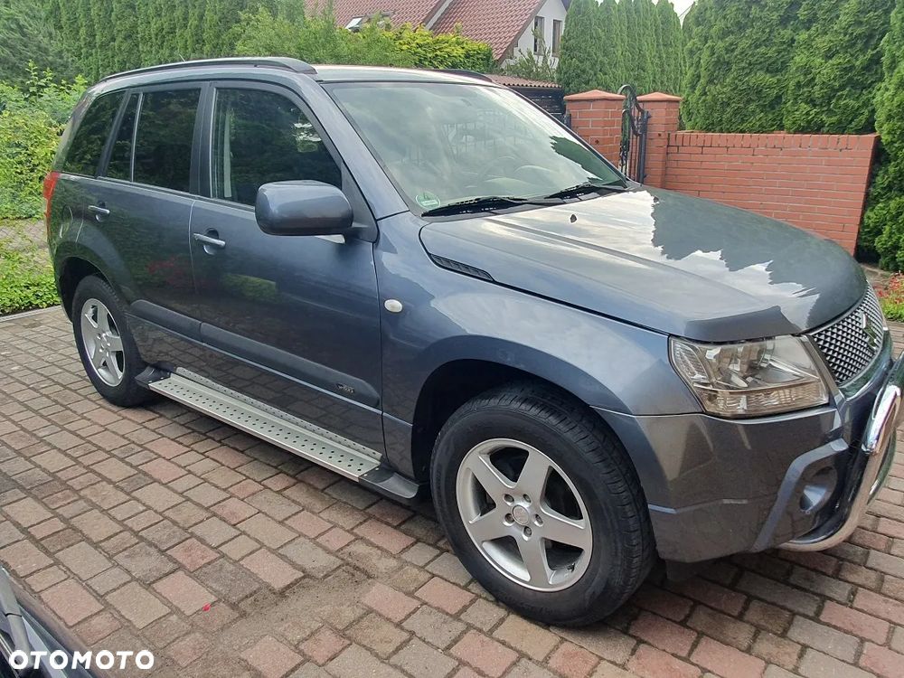 Suzuki Grand Vitara 2.0 Comfort + Family - 7